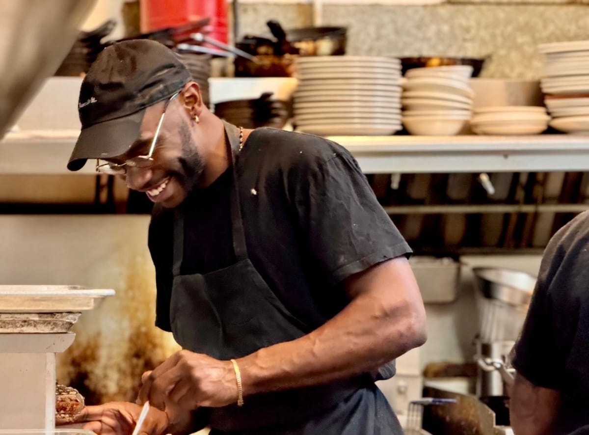 Chef Jahquari cooking in the kitchen